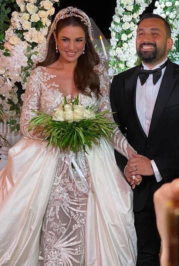 العروسان درة التونسية وهاني سعد