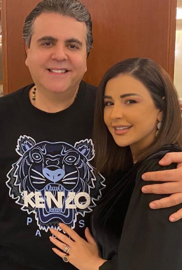 ماغي بو غصن وزوجها