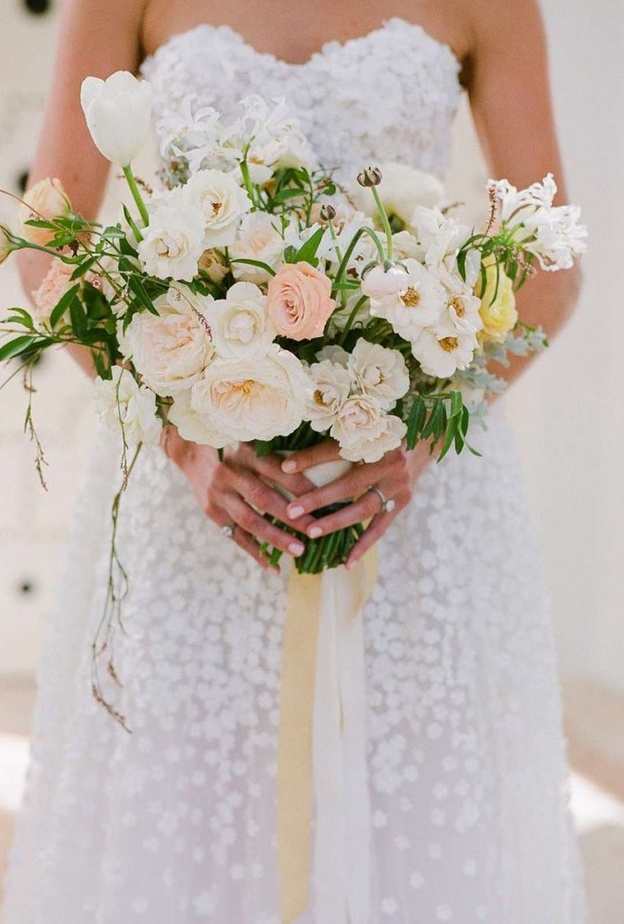 استخدام أنواع مختلفة من زهور التيوليب الوردية مثل Parrot Tulips، Fox Trot Tulips