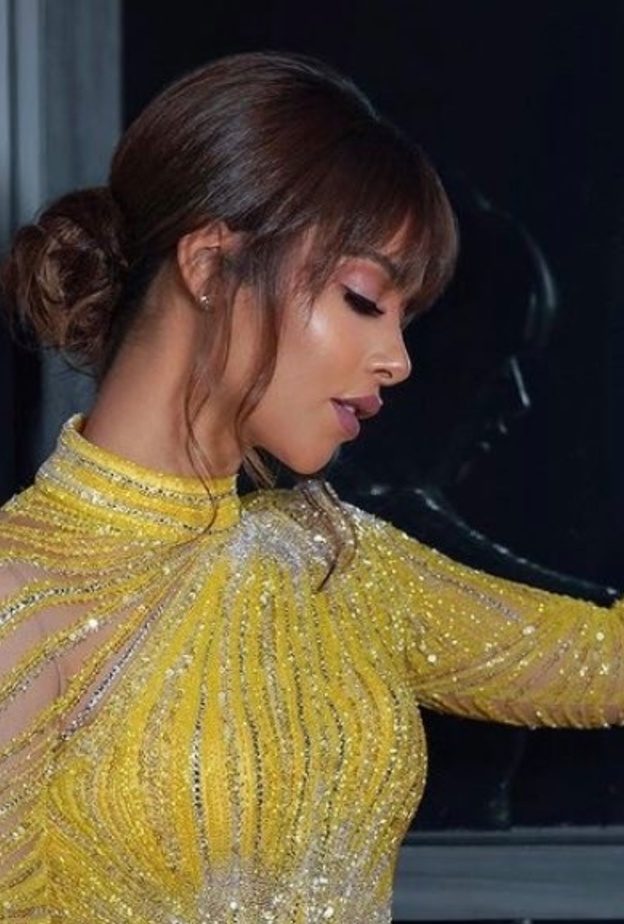 تسريحات شعر2021 مع الكعكة مستوحاة من بلقيس فتحي يوم المرأة العالمي