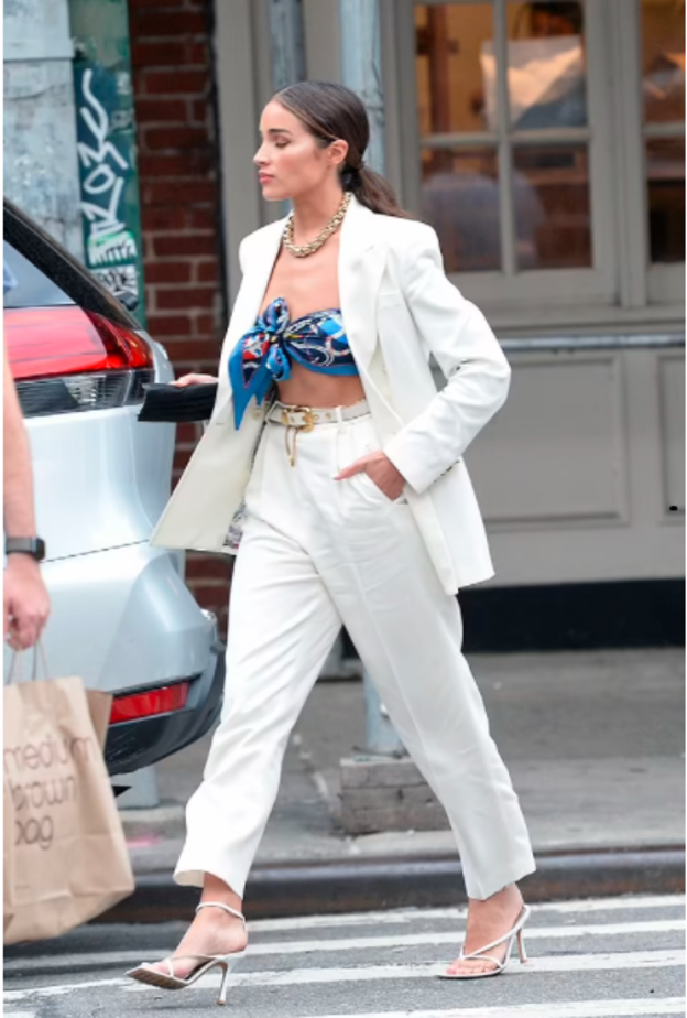 صور اوليفيا كالبو تستعرض رشاقتها في أحدث إطلالاتها بالأبيض