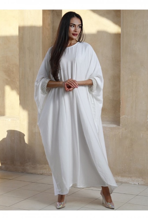 قصّّة المعطف الأنيقة بعباية صيفية جذابة من تصميم Asmalmarri