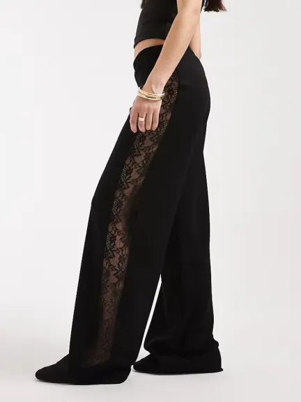 بنطال واسع أسود بدانتيل من الجوانب من ASOS DESIGN	