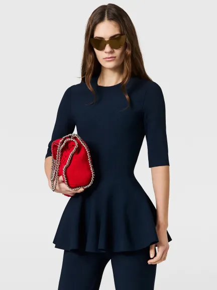 توب محبوك بقصة Peplum من Stella McCartney	