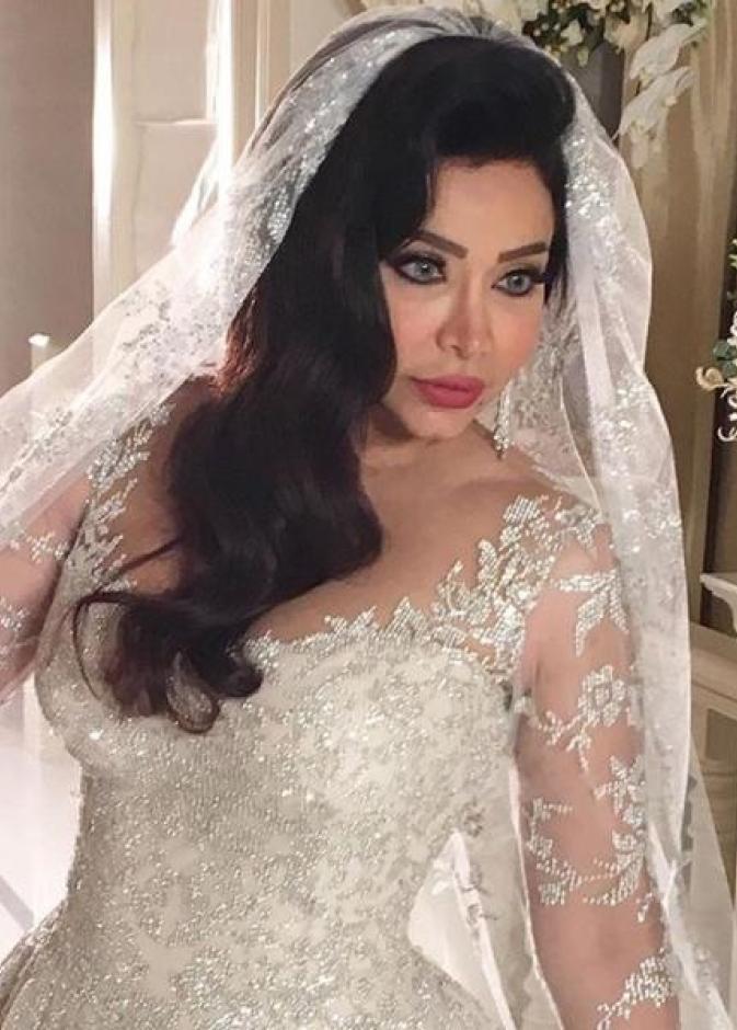 نجوى كرم بفستان الزفاف في ال2015.