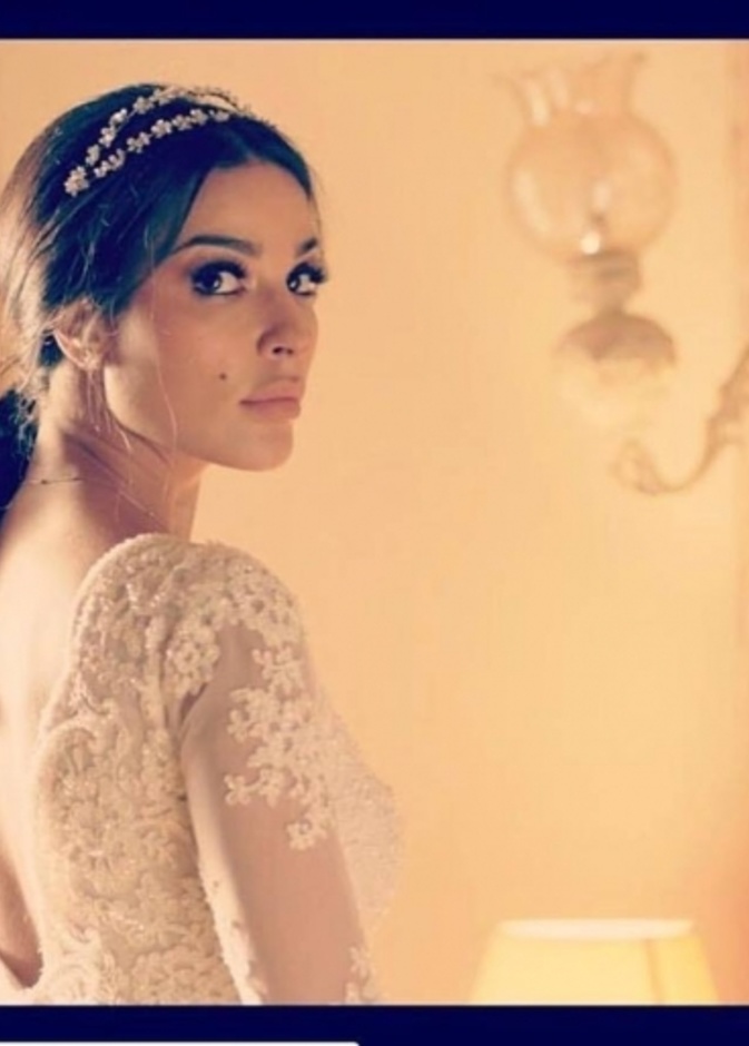 نادين نجيم في مسلسل الهيبة ترتدي الابيض وتتميز باطلالة انثوية