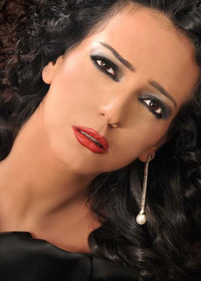 أمل عرفة مع زوجها عبدالمنعم عمايري