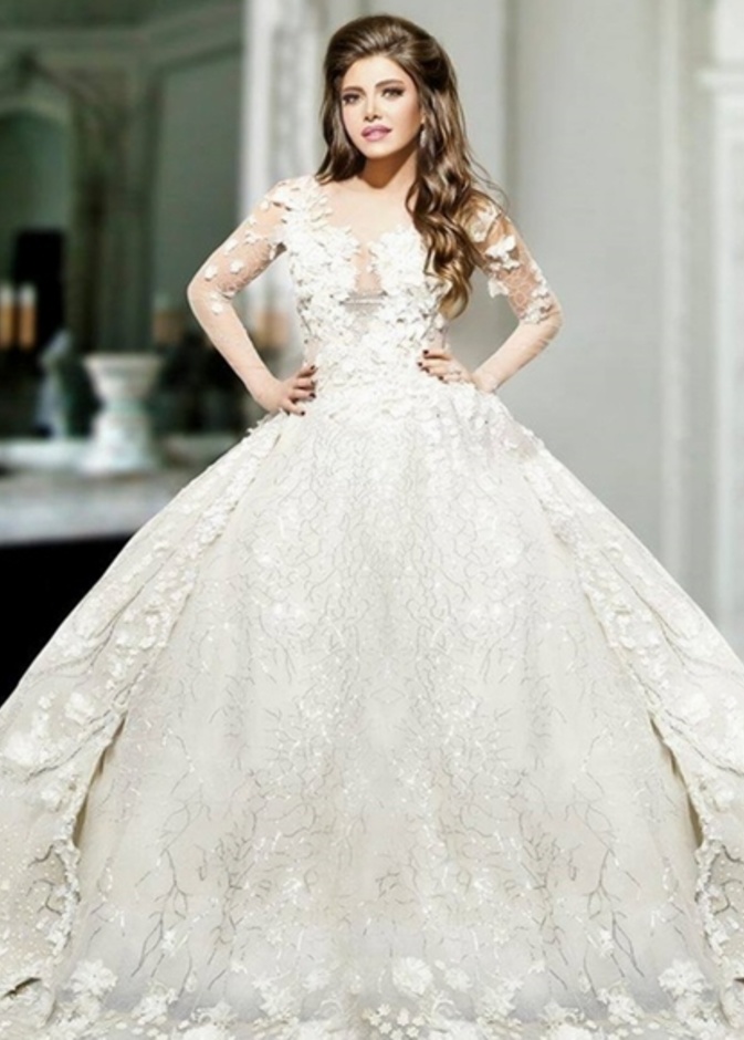 ريهام حجاج فاجأت الجمهور بصورها وهي ترتدي فستان زفاف