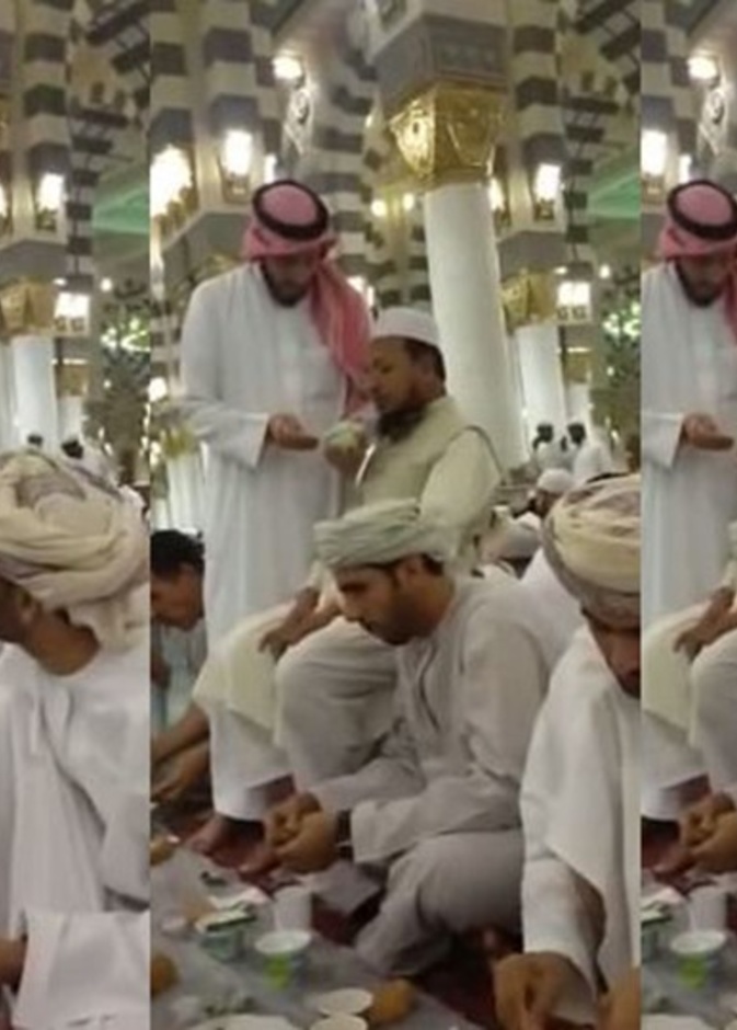 بالفيديو: سعودي يساعد معوّقاً على تناول إفطاره بالمسجد النبوي