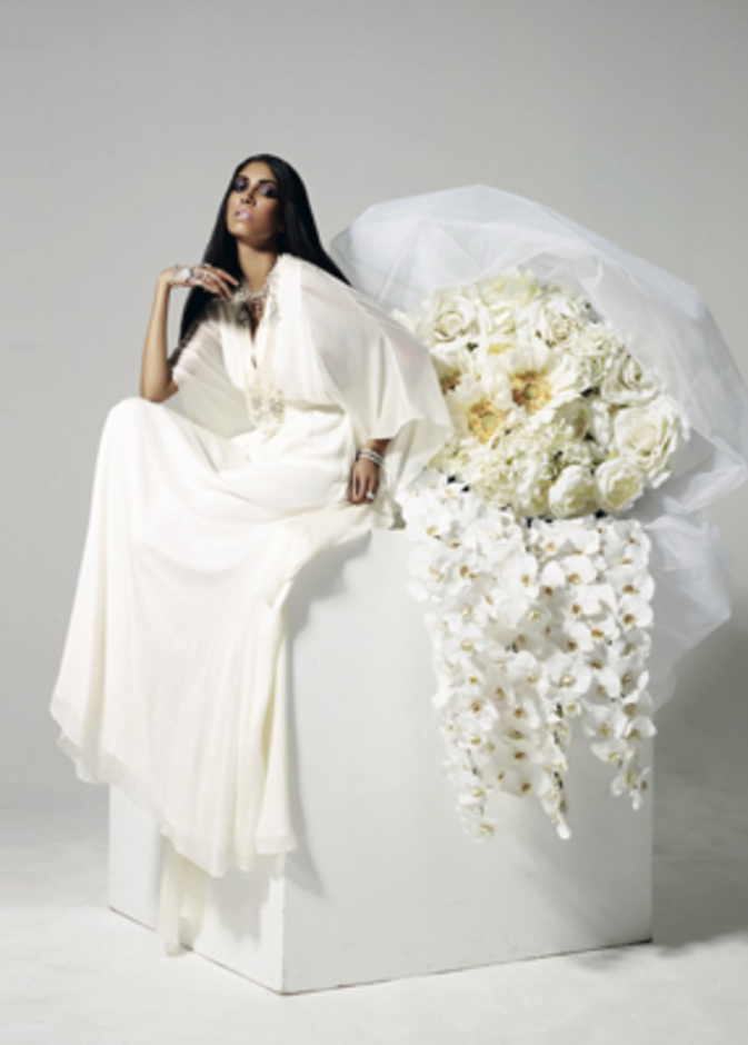 الفستان تصميم ”ماثيو ويليامسون” Matthew Williamson لدى Net-A-