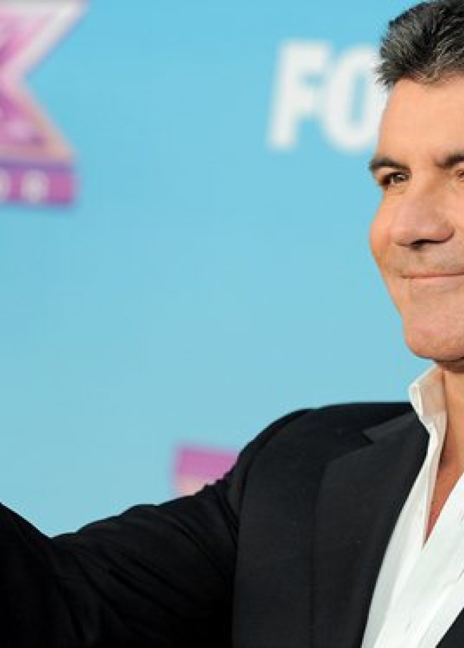 سيمون كويل يرغب بالتوافق بين حكام The X Factor