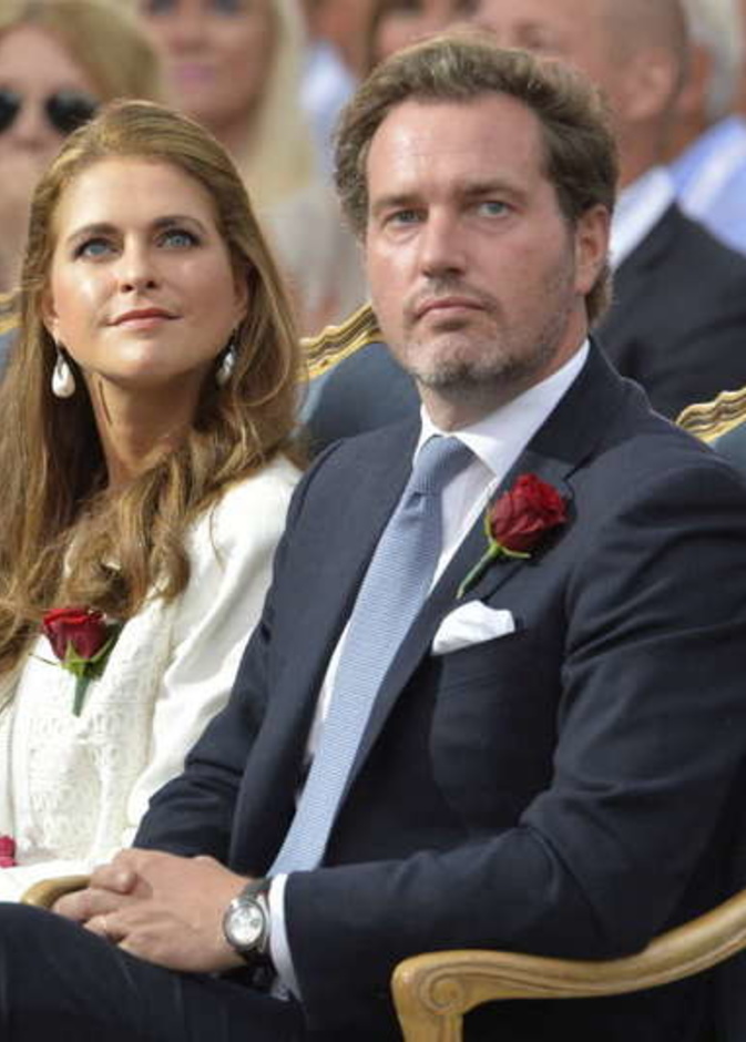 الأميرة تتوسط الأمير فيليب وزوجها كريس