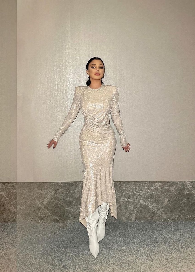 موديلات فساتين سهرة للمناسبات الشتوية من النجمات العربيات 