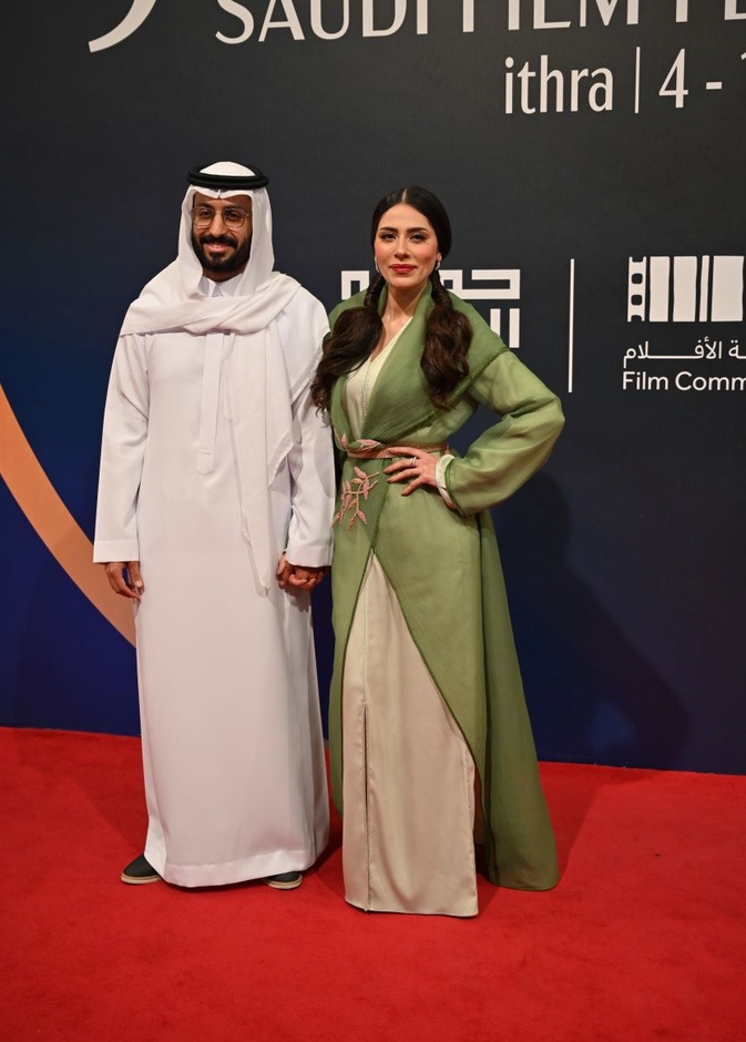 إلهام علي وزوجها خالد صقر