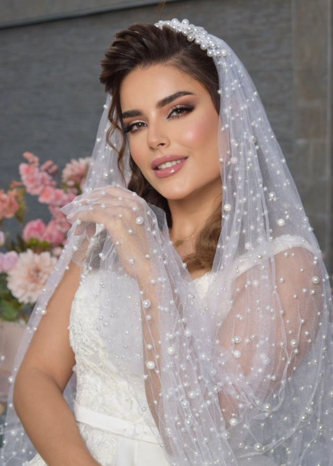 من تصوير العرايس بكاميرا المصوره علياء صادق