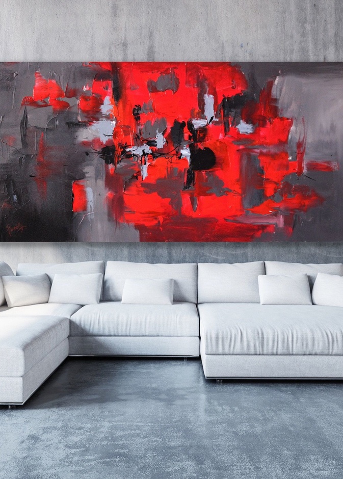 الأحمر يجذب الأنظار ويكسر روتين الألوان الحيادية في الديكور