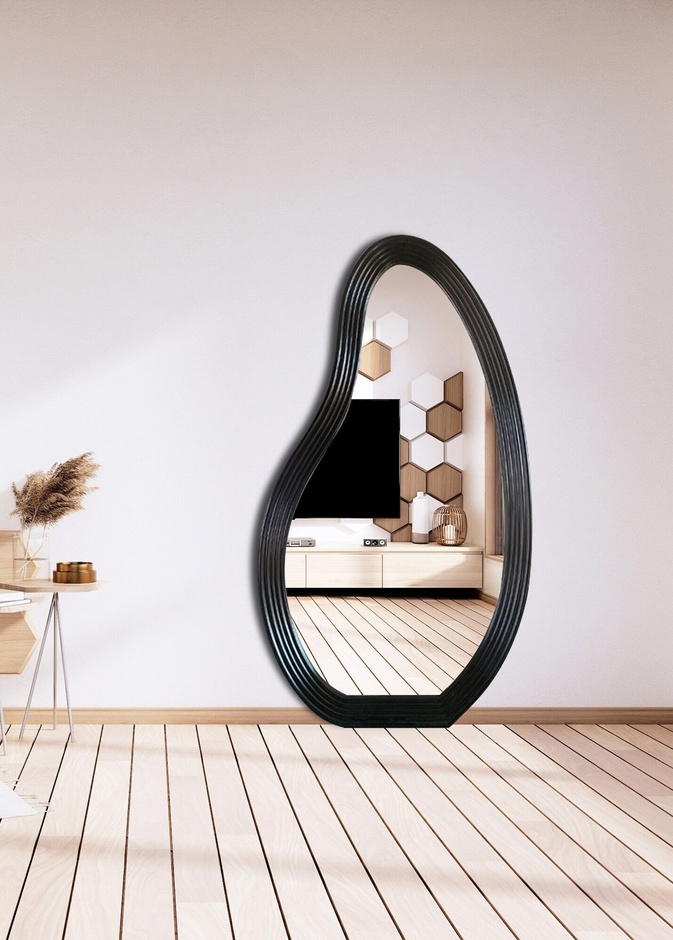 تصميم مرآة تشكل قطعة فنية ضمن ديكور المنزل