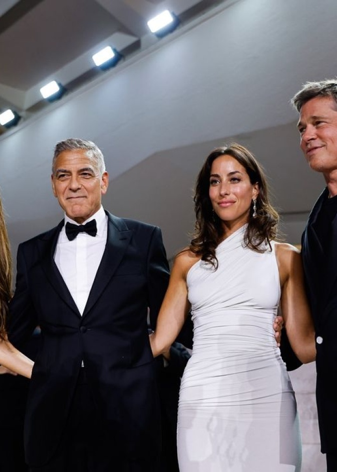 جورج وأمل كلوني وبراد بيت وشريكته في فينيسيا