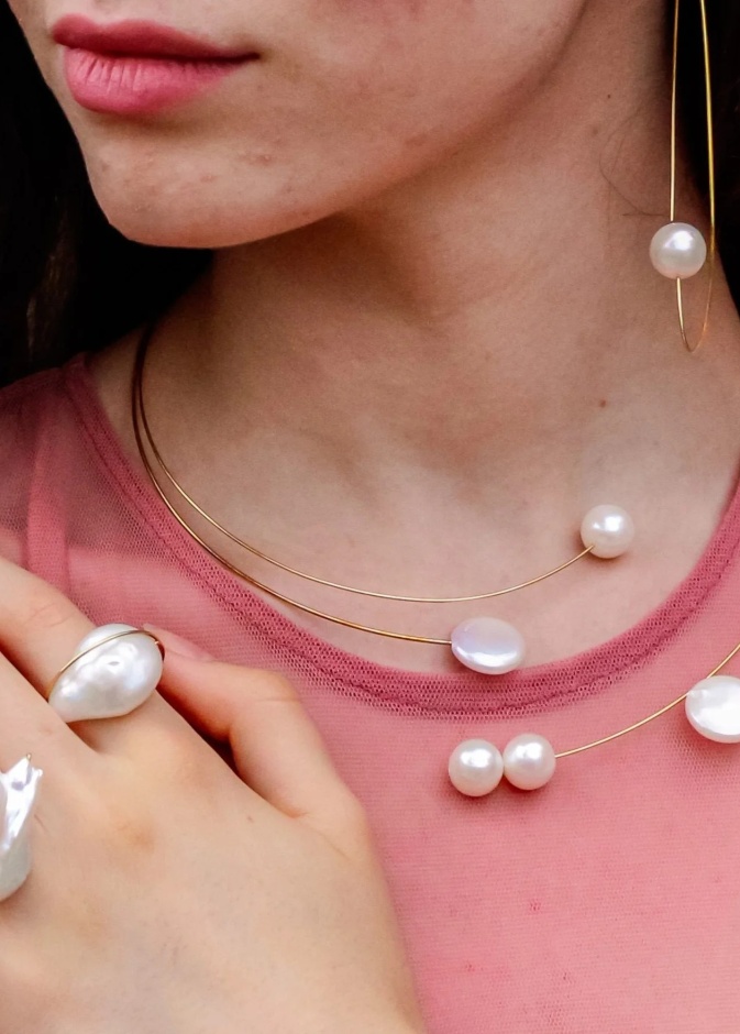 أناقة خاتم اللؤلؤ الباروكي من mateo