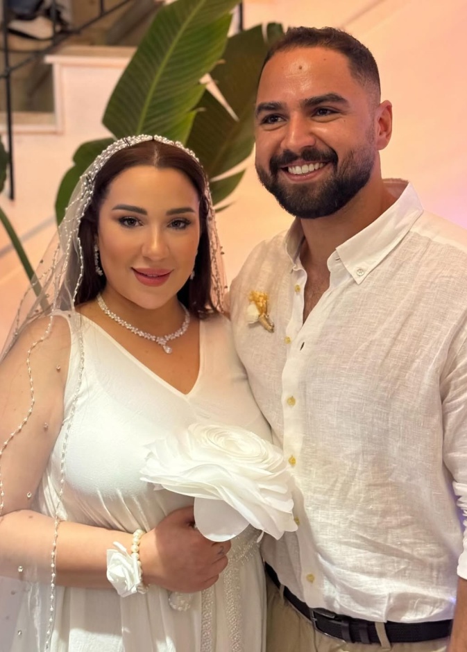 أسما شريف منير وزوجها