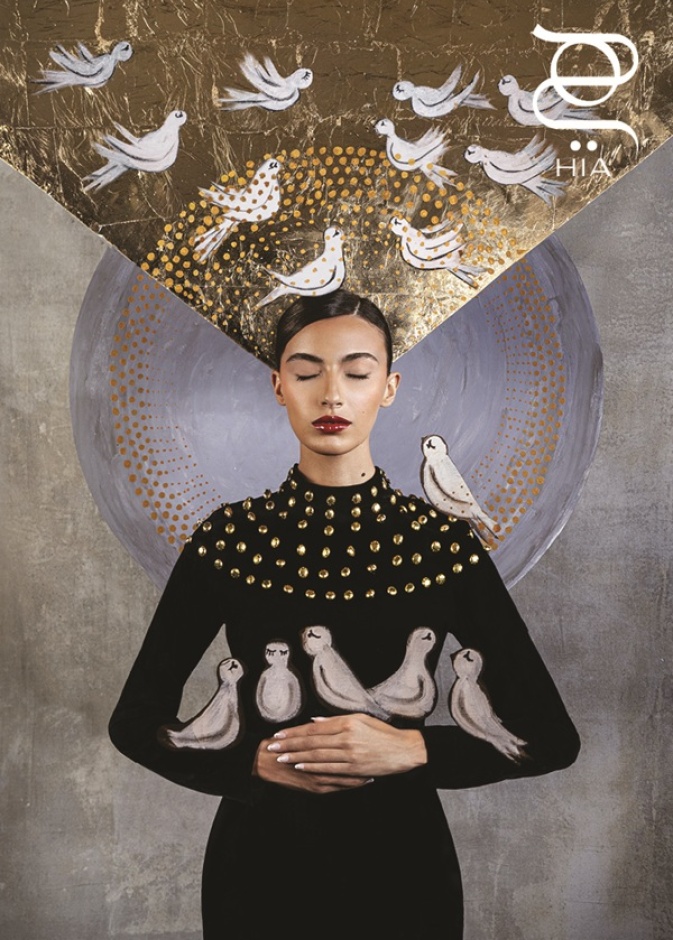 من لوحة "أبعاد الحرية" لتغريد البقشي إلى فستان أيقوني... تصميم "لوديانا" يتألق على غلاف مجلة "هي"