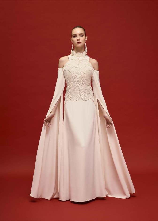 عروس دعاء الغوطي بفستان زفاف مطبع