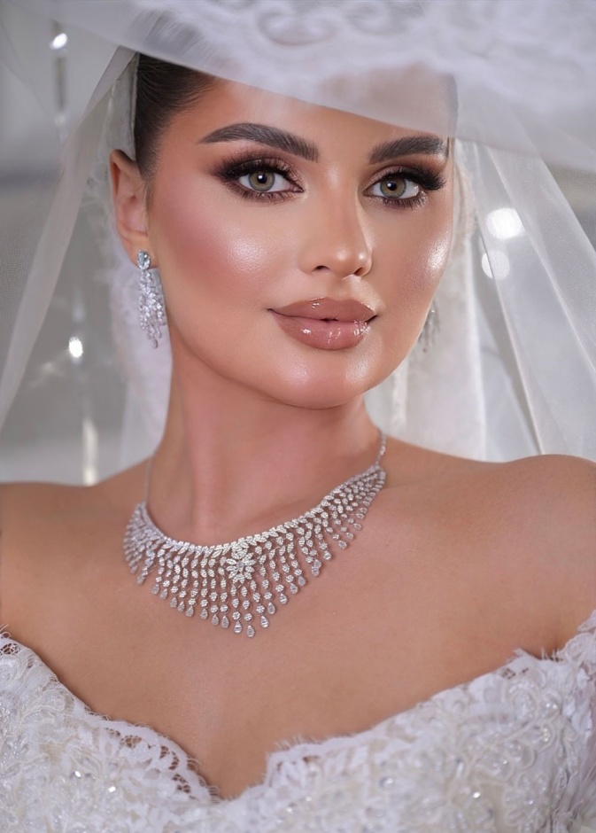 تصوير عروس بكاميرا المصورة منى الباز