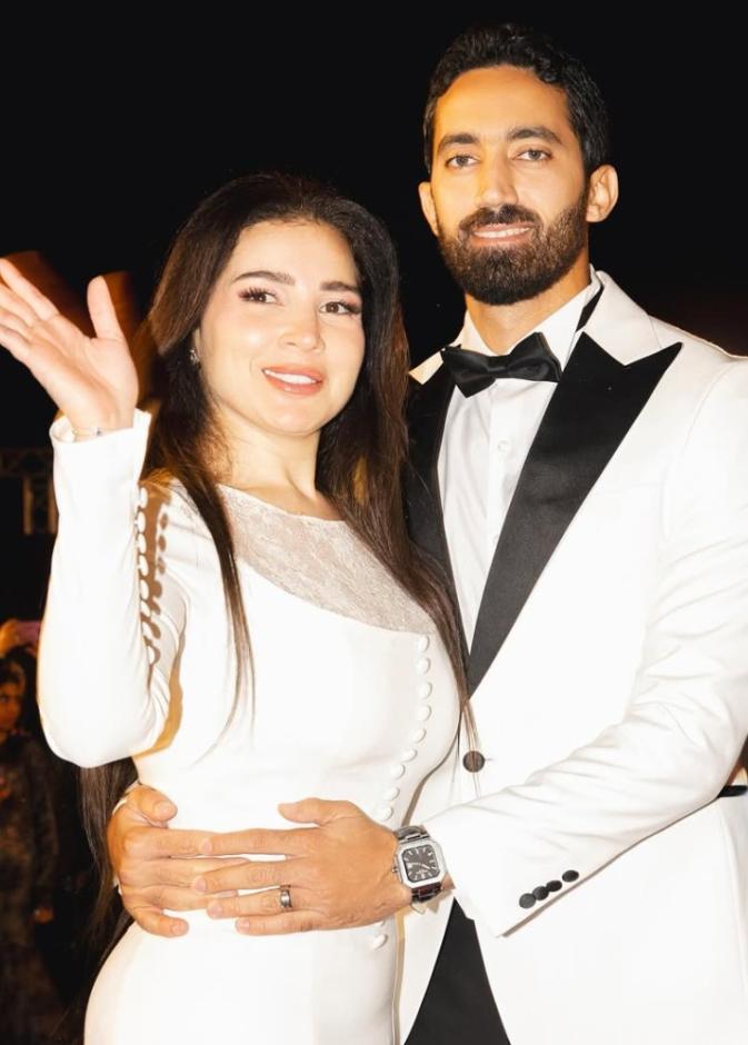 مي عز الدين وزوجها