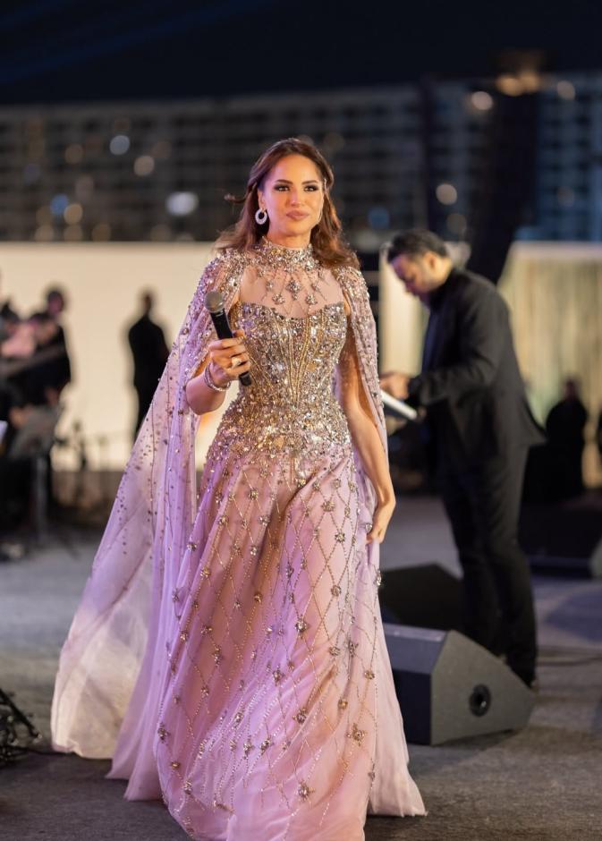  آمال ماهر بفستان باللون البنفسجي الناعم