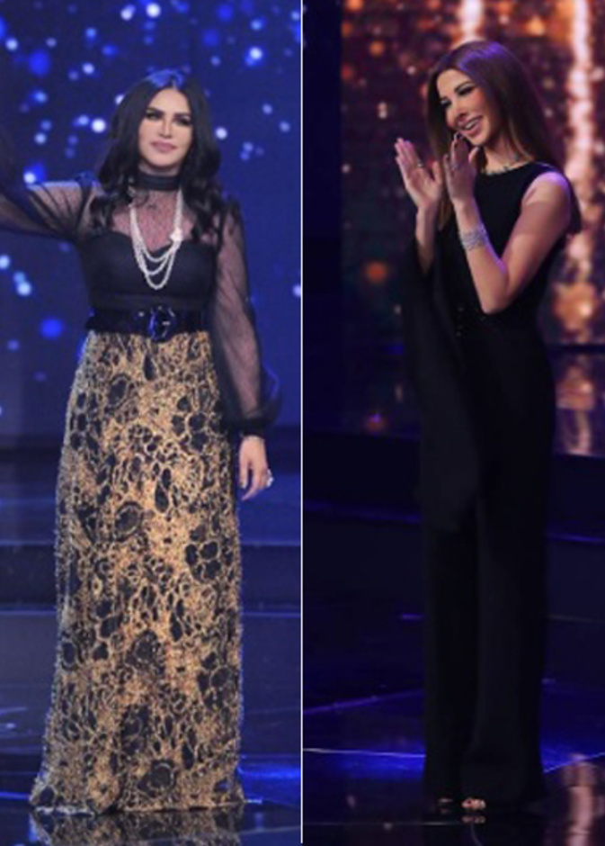 نانسي عجرم بموضة الجمبسوت الأسود مع الأكمام المكشوفة