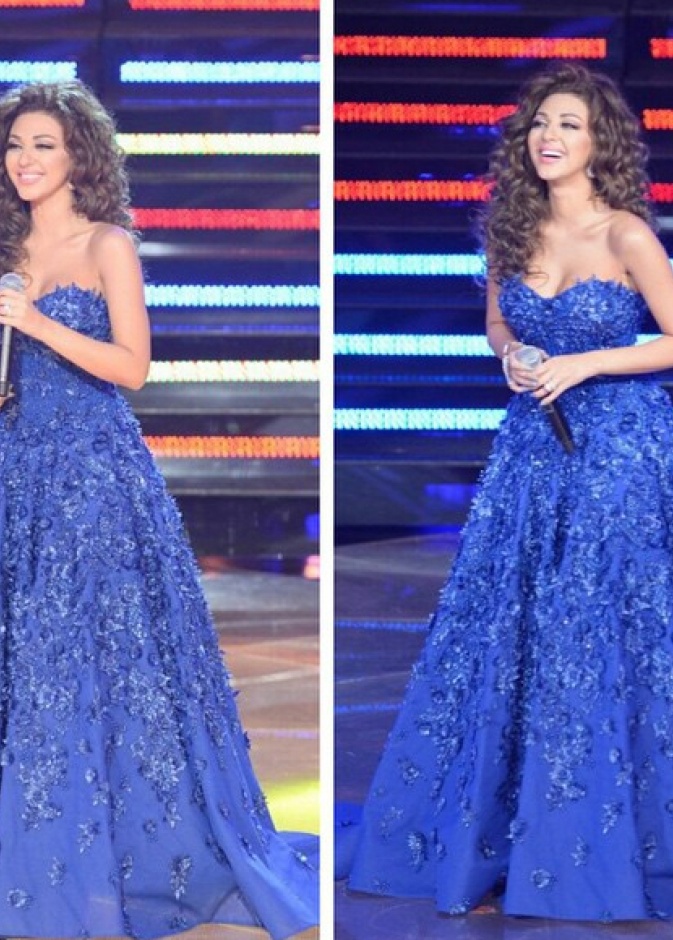 Myriam Fares in top by Laberla Lingerie and skirt by Stella McCartney