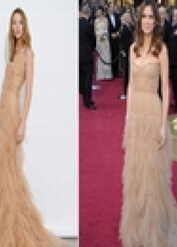 كريستين ويج على السجادة الحمراء في حفل توزيع جوائز الأوسكار 2012 