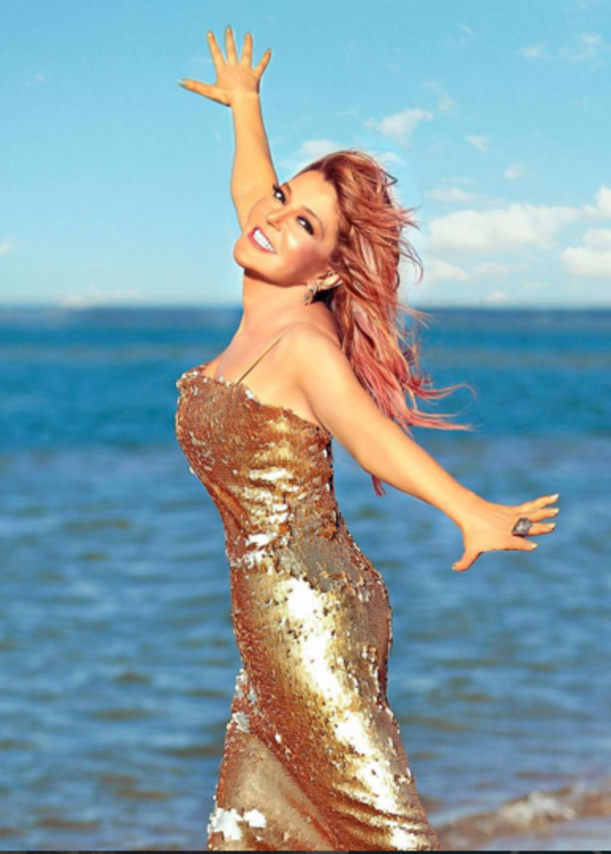 سميرة سعيد  وصورة من جلسة تصوير حديثة لها