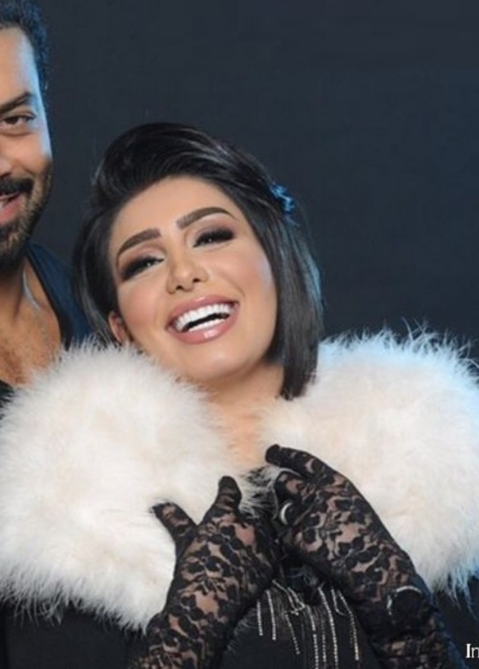 مع زوجها مع محمد الحداد