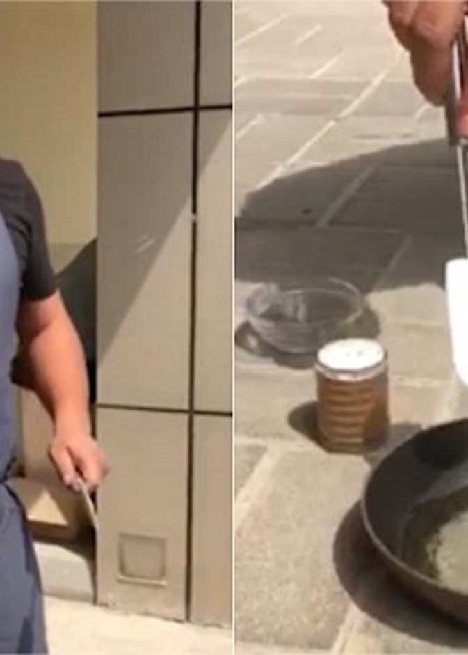 شاب يقلي البيض على حرارة الشمس في دبي