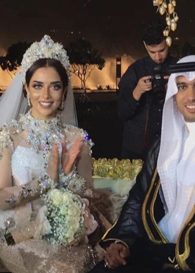بلقيس بالفستان الابيض مع عريسها
