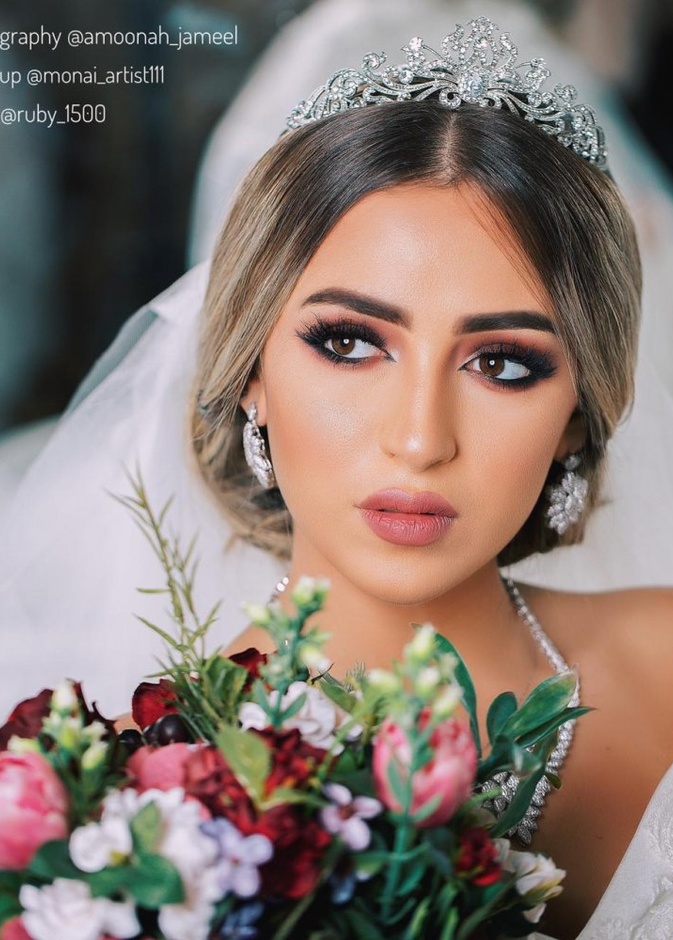 لقطة عروسين من المصورة آمنة جميل