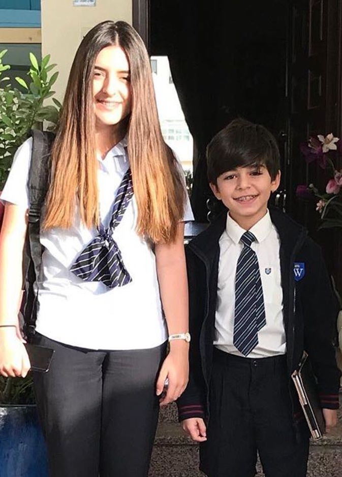 ابني عابد فهد ليونا وتيم في أول يوم دراسي لهما