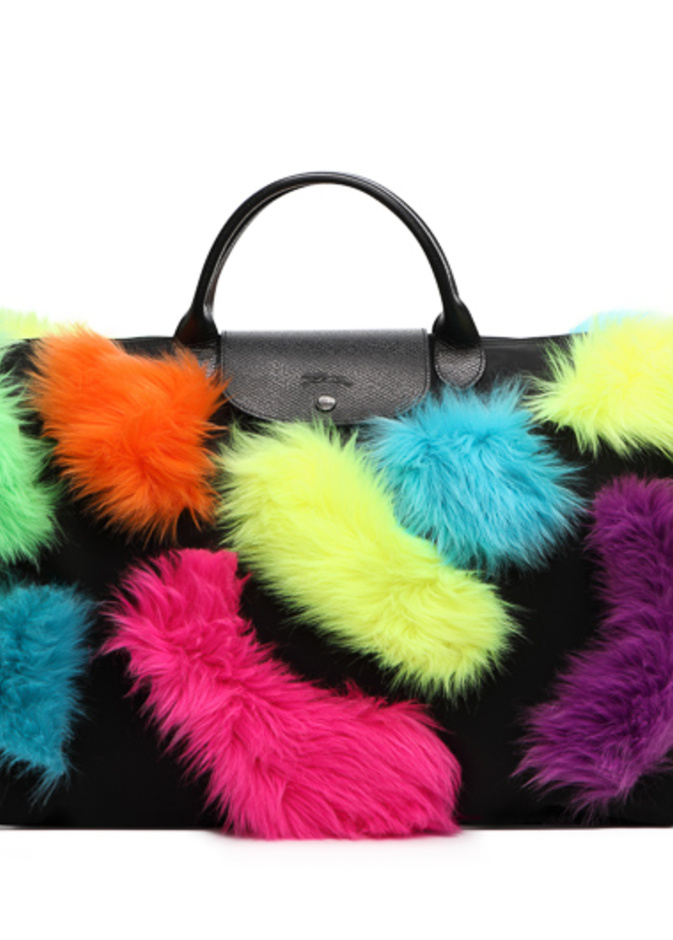 عمل جيريمي سكوت بكل سرور على تحديث حقيبة Neon من تعاونه في شتاء 2018 مع لونشان Longchamp