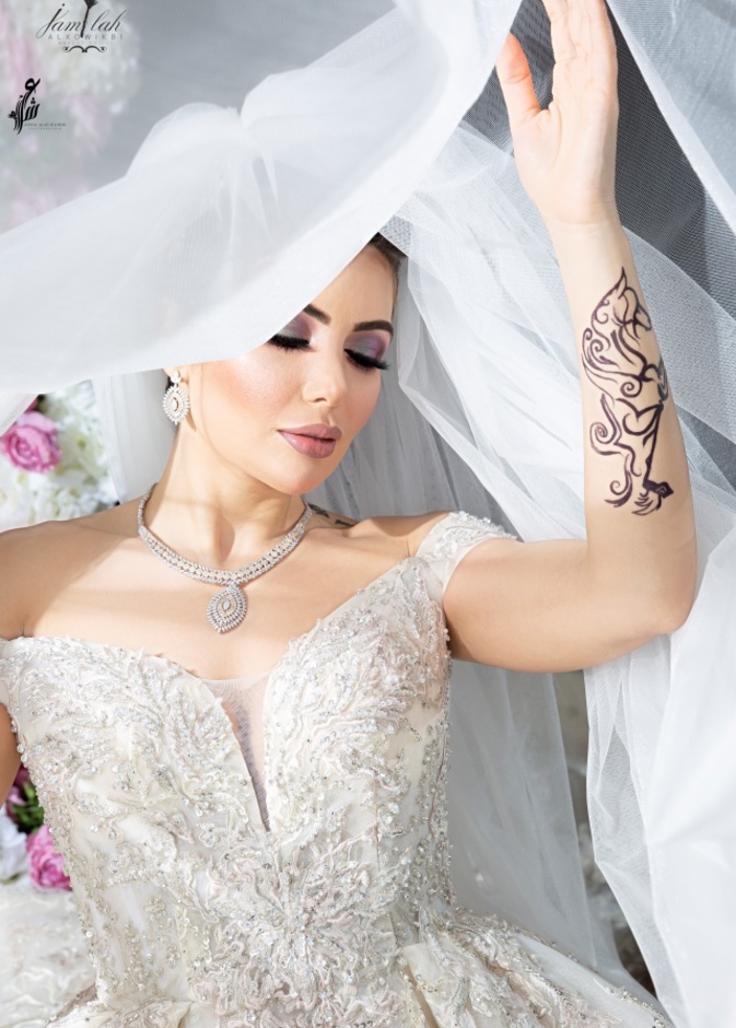 لقطات متنوعة للعروس من المصورة عائشه الكويكبي