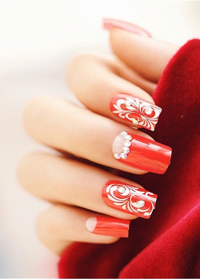 احدث اشكال و رسومات مناكير باللون الاحمر لعروس يوم الحب