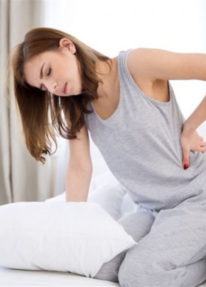 أسباب آلام الظهر بعد الولادة القيصرية وطرق تجنبها