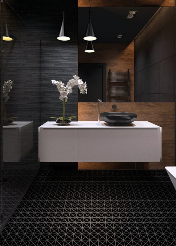 الرخام باللون الأسود في ديكورات الحمامات فخامة وأناقة