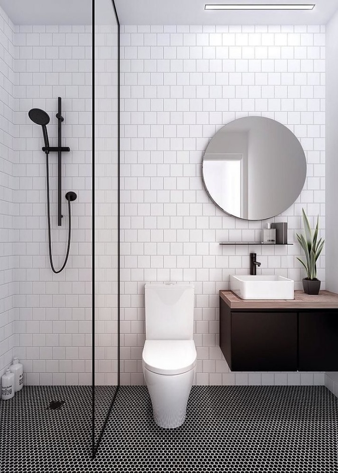 الأبيض ببساطته وبتصاميم جدران عصرية لديكور حمام صغير مودرن