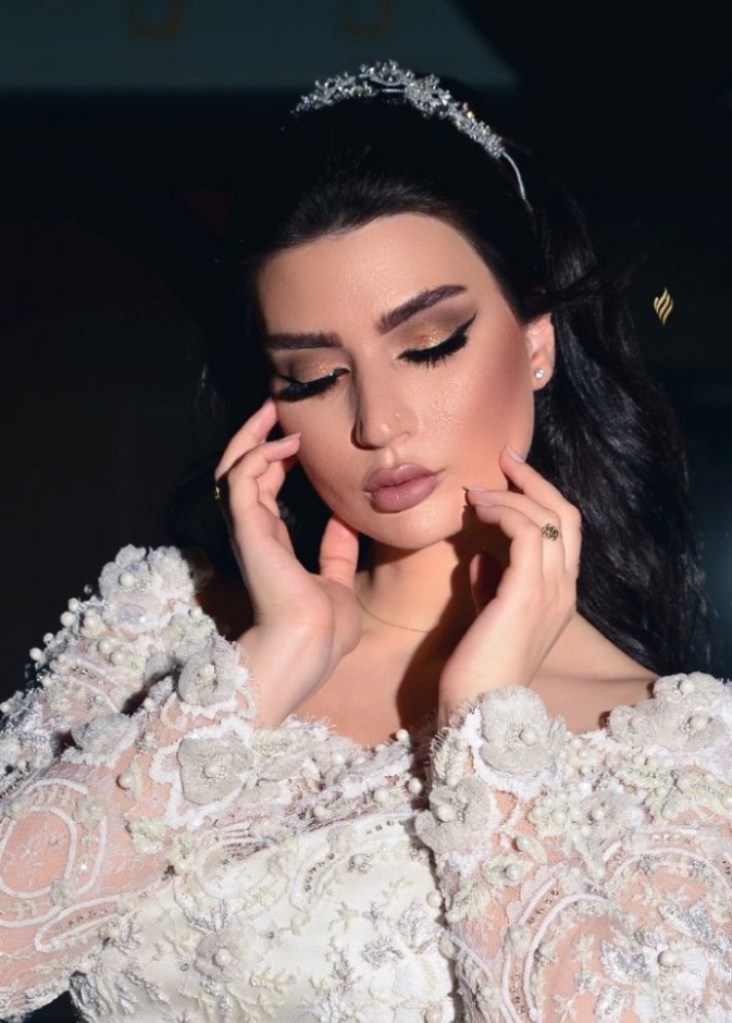 تصوير عروسين بكاميرا المصورة السعودية أمل حماص