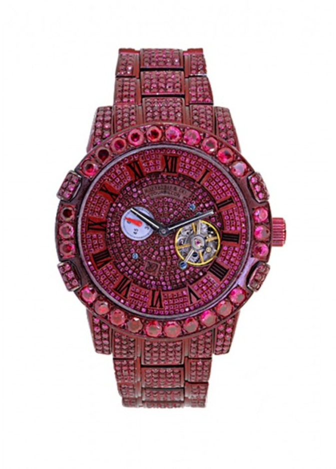 ساعة فاخرة مكسوة بالماس والياقوت من Harry Winston