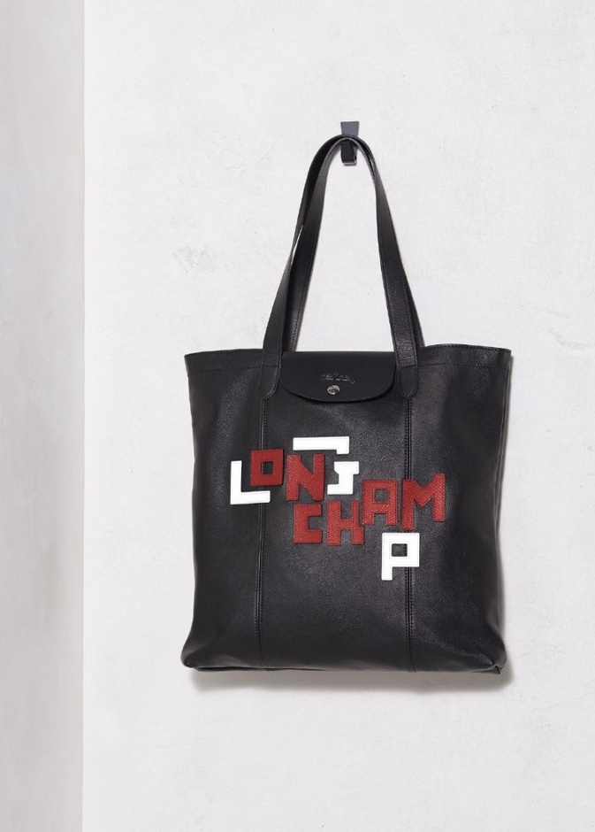 اكتشفي دليل الهدايا من Longchamp لمناسبات نهاية العام