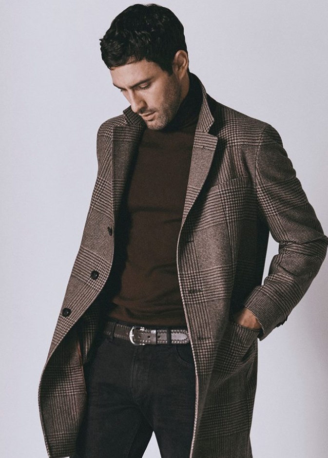 اختار نواه معطف شتوي بلون البيج مع سروال بنقشة الكارو بأسلوب ملفت