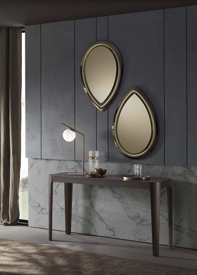 الزجاج مع المعدن في تصميم كونسول عصري