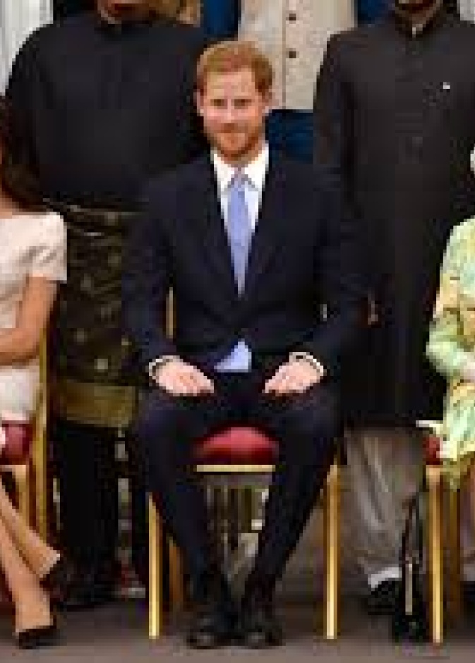 الملكة اليزابيث والأمير هاري وميغان